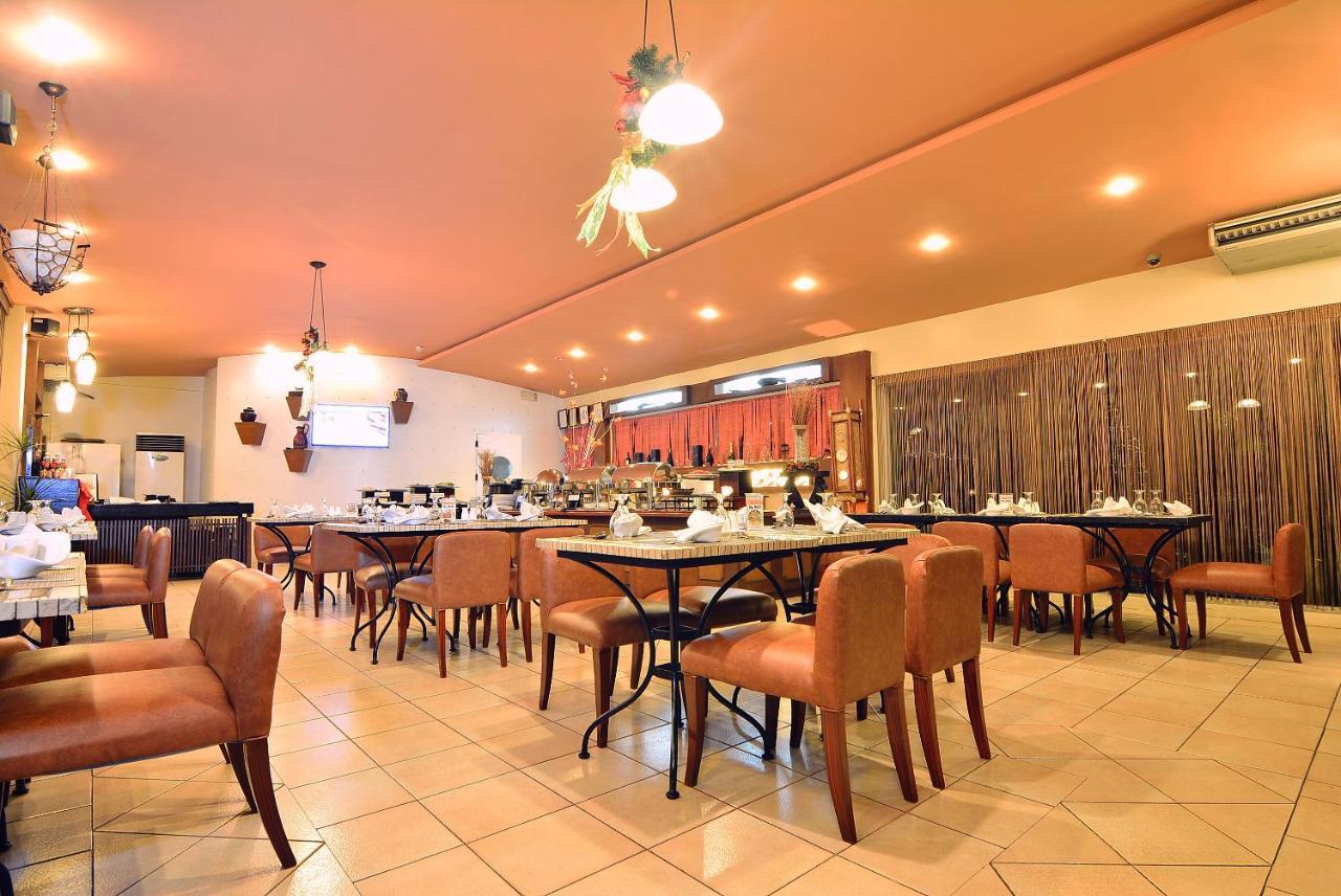 Citystate Asturias Hotel Palawan Puerto Princesa Esterno foto