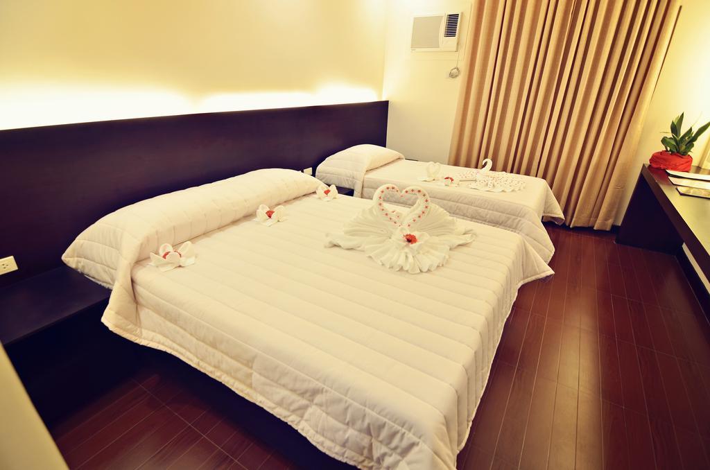 Citystate Asturias Hotel Palawan Puerto Princesa Esterno foto