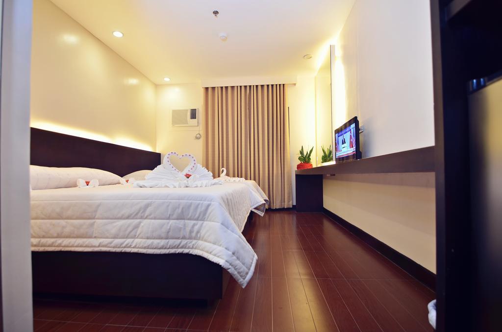 Citystate Asturias Hotel Palawan Puerto Princesa Esterno foto